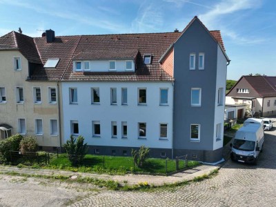 Erstbezug - hochwertig saniertes Mehrfamilienhaus mit Luftwärmepumpe, Einbauküche & Garten
