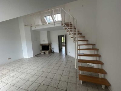 Charmante 2-Zimmer-Maisonettewohnung mit stilvoller Galerie und TGplatz – zentrale Toplage in Tsst