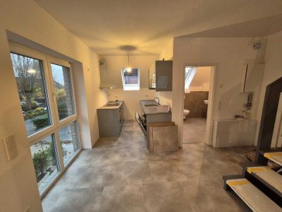 A+ Moderne 2-Zimmer-Einliegerwohnung in Hamburg-Poppenbüttel – Neubau mit Gartenanteil!