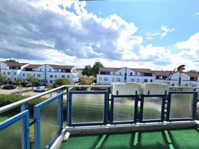 Lichtdurchflutete 2 Raumwohnung mit Südbalkon, Tiefgaragenstellplatz und Blick ins Grüne