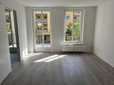 Moderne Familienwohnung mit Balkon und Mietergarten!