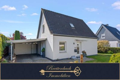 Einziehen & Wohlfühlen: Gepflegtes Einfamilienhaus mit Pool und Teich