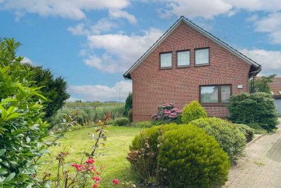 Gestaltbares Zuhause in Jork: EFH mit Südwest-Garten, Garagen und Sanierungsbedarf