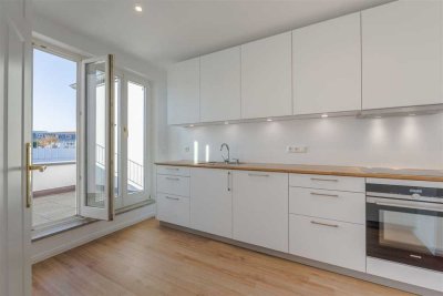 2 Zimmerwohnung mit hochwertiger Einbauküche und Dachterrasse in Zentrumsnähe