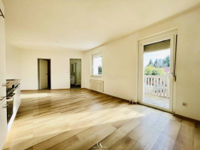 Jetzt einziehen &amp; sparen: 2 Monate halbe Miete! Große 4-Zimmer-Wohnung mit Balkon, 2 Parkplätzen &amp; großem Gemeinschaftsgarten!