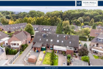 Gepflegtes Reihenmittelhaus mit Garten und Garage in Borssum