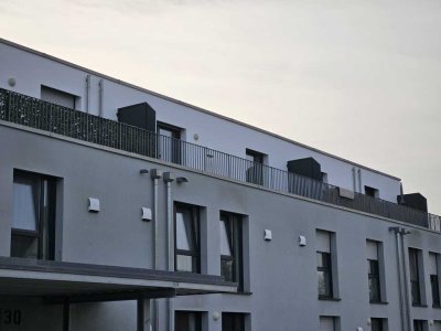 2-Zimmer-Neubauwohnung mit Einbauküche und Dachterrasse im Penthouse-Stil