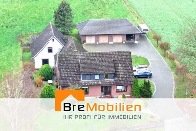 3 Häuser - eine Kapitalanlage! In Achim-Borstel mit 4 Garagen & Weideland!