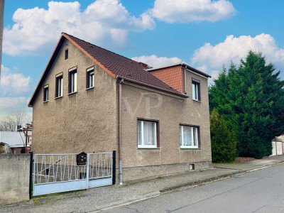 Einfamilienhaus mit kleinem Garten, neuer Heizungsanlage und Nebengelass in ruhiger Lage von Biehla