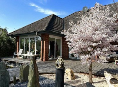Einfamilienhaus am Elbdeich mit Koiteich und großzügigem Garten