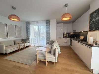KENSINGTON - Exklusiv - neuwertige 2-Zimmer-Wohnung mit Terrasse und eigenem Garten