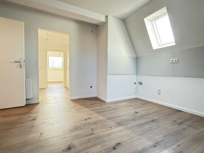 Moderne 1,5 Zi-Dachgeschosswohnung in einer Stadtvilla