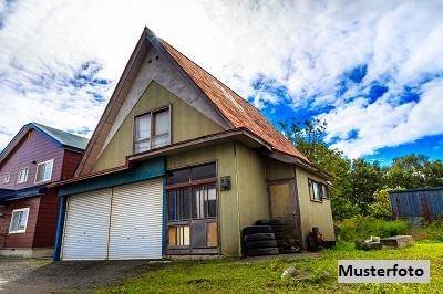 Kleines Einfamilienhaus in steiler Hanglage