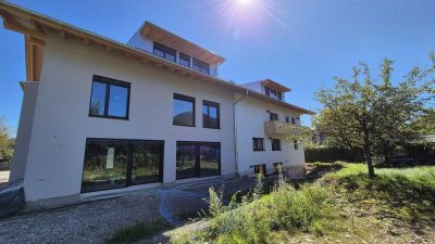 Erstbezug: 2,5-Zi.-Whg. (95 m²) Hochparterre mit Erker, Terrasse, Südgarten & Eingang