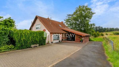 Charmantes Einfamilienhaus mit großem Grundstück und EBK in ruhiger Lage