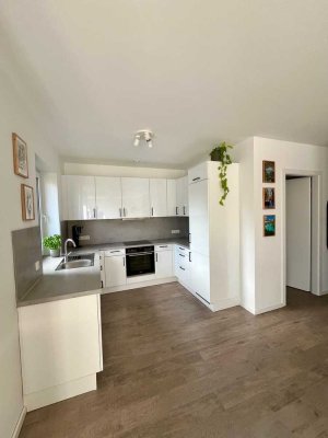 Lichtdurchflutete 2-Zimmer-Neubauwohnung mit Balkon, Einbauküche und Außenstellplatz in Borken