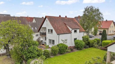 Zweifamilienhaus mit Entwicklungspotenzial – Zwei Wohnungen, großer Garten & Bauplatz in guter Lage
