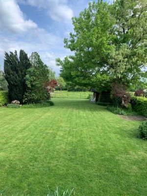 Lichtdurchflutete Wohlfühlwohnung mit Terrasse und Garten