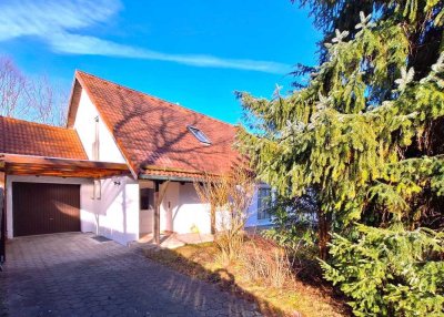 **Attraktives Einfamilienhaus mit idyllischem Garten und Garage in Neufahrn-Süd (S1)**