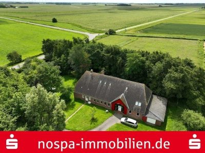 Wohnen und Vermieten unter einem Dach! Ganz idyllisch und nah am Deich!