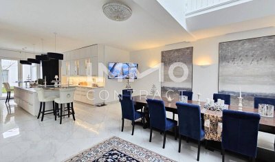 Zeitlose Architektur trifft Großzügigkeit - Designvilla mit Indoor-Pool und Einliegeroption