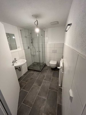 Erstbezug nach Sanierung - Helle und hübsche  2,5-Zimmer-Souterrainwohnung