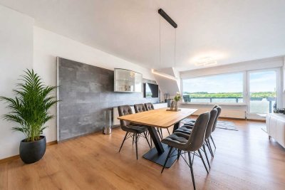 Frische Leichtigkeit mit Seeblick: Stilvolle Dachgeschoss-Maisonette in ruhiger Lage