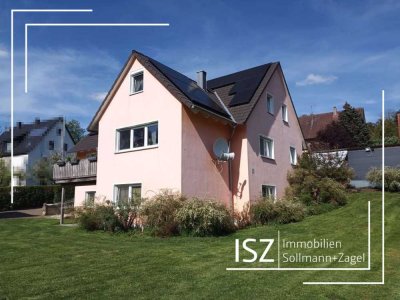 Hochwertiges Einfamilienhaus mit gewerblicher Nutzung in idyllischer Südwest-Lage mit großem Garten