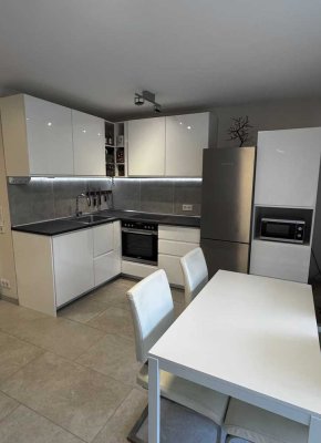 Charmante 2-Zimmer-Wohnung mit Garten und Tiefgaragenstellplatz in Zentraler Lage von Neuss