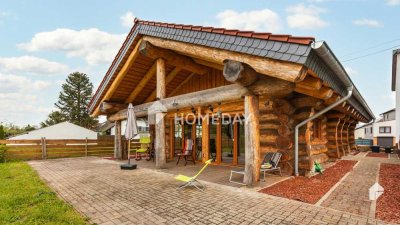 Ihr Traumhaus im Blockhausstil – Naturnahes Wohnen auf großzügigem Grundstück