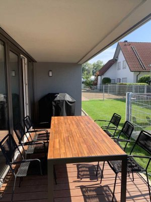 Hochwertige und stilvolle Wohnung mit Garten und Terrasse - Teilmöbliert