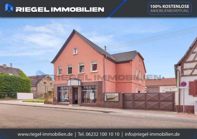 Sie hier? Wir auch! Repräsentatives Wohn- und Geschäftshaus mit Ladeneinheit und zwei Wohnungen