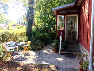 Traumhaftes Holzhaus mit großem Garten