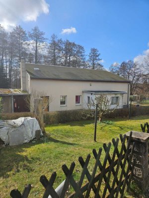 Unsaniertes Gebäude in Top Lage