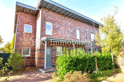 Architektenhaus mit Einliegerwohnung und separatem Gewerbeobjekt – Wohnen und Arbeiten vereint