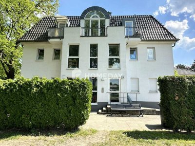 Attraktive 2-Zimmer-Wohnung mit Balkon, Fußbodenheizung, Gäste-WC und Gartenzugang