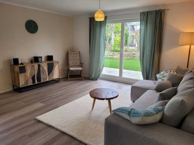 Top sanierte Wohnung, teilmöbliert mit großem Garten