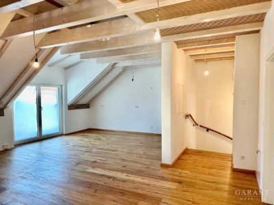 Lichtdurchflutete Maisonette-Wohnung mit großer Sonnenterrasse