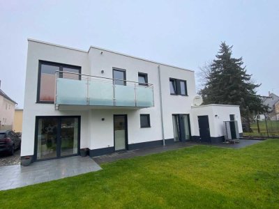 Helle und optimal geschnittene Neubauwohnung in ruhiger Lage