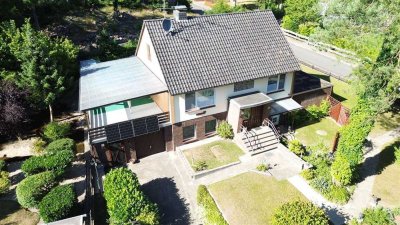 Solides Einfamilienhaus mit Einliegerwohnung in exponierter Wald Lage, mit Erweiterungspotenzial.