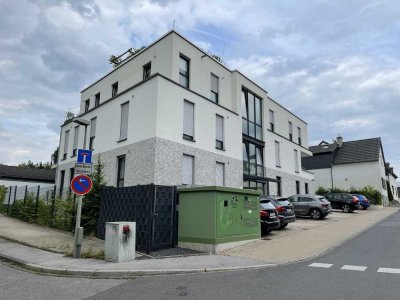 Schmuckstück im Zentrum: barrierefreie Wohnung mit kleinem Garten und Außenstellplatz