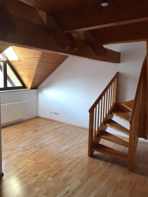 Gemütliche 1,5 Zimmer Maisonette-Wohnung im Dachgeschoss mit Kachelofen