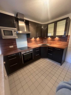 Vollständig renovierte helle 1-Zimmer-Wohnung mit Balkon und Einbauküche in Putzbrunn