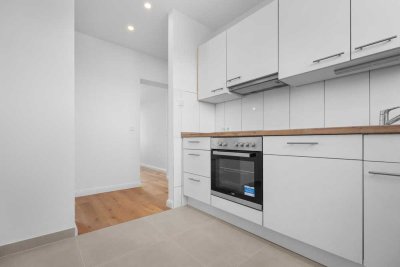 Erstbezug nach Sanierung - 3 Zimmer, Einbauküche und Balkon