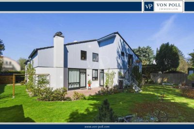 Architektenhaus für 2 Familien mit Einliegerwohnung & Garagen!