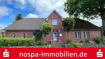 Einfamilienhaus mit Einliegerwohnung und Carport im Herzen von Oevenum