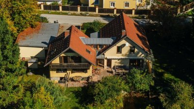 Großzügiges Einfamilienhaus mit Schwimmteich in Weinitzen - ländliche Geborgenheit trifft modernen Wohnkomfort