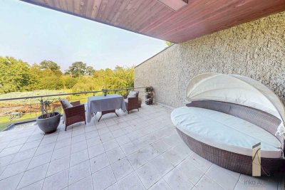 Traumhafte Erdgeschosswohnung mit großer Terrasse und Gartenanteil!