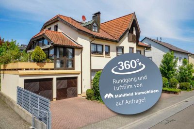 Dreifamilienhaus mit zwei vermieteten Einheiten und einer Doppelgarage!