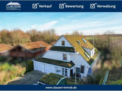 Horizontale Doppelhaushälfte mit grünem Dach und sehr gutem Energieverbrauch in Flintbek!